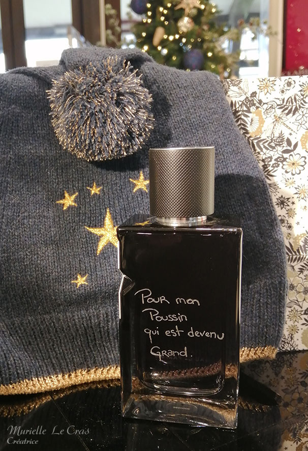 Flacon de parfum Yves Saint Laurent, personnalisé avec une phrase gravée.